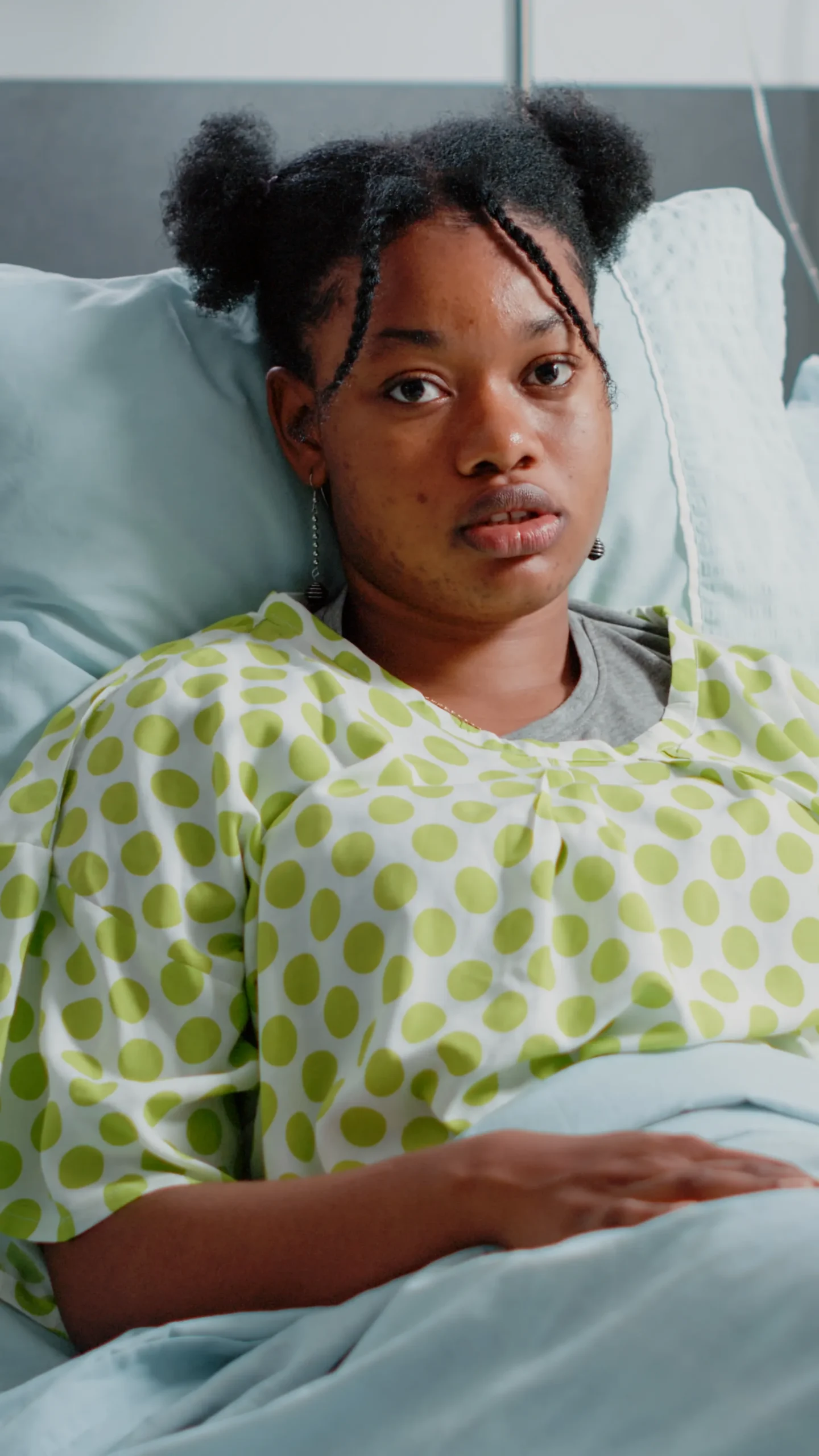 portrait-woman-with-iv-drip-bag-hospital-ward-bed-young-patient-with-sickness-preparing-receive-healthcare-treatment-medicine-against-disease-ill-person-looking-camera_converted